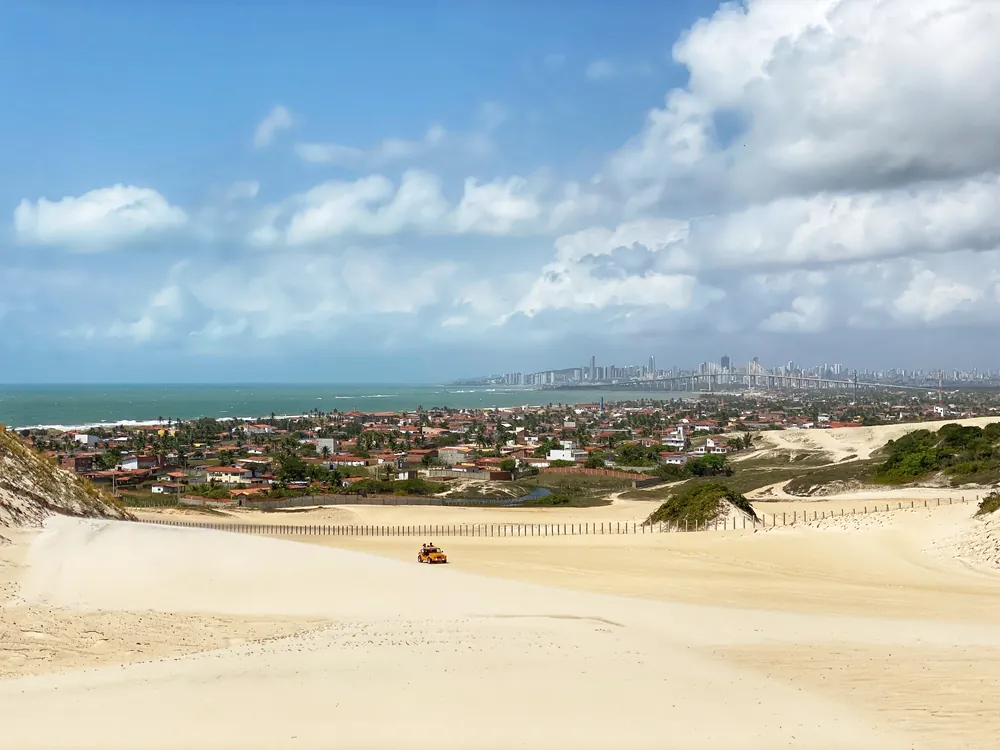 Sand dunes overlooking the Atlantic coast at Genipabu, Brazil